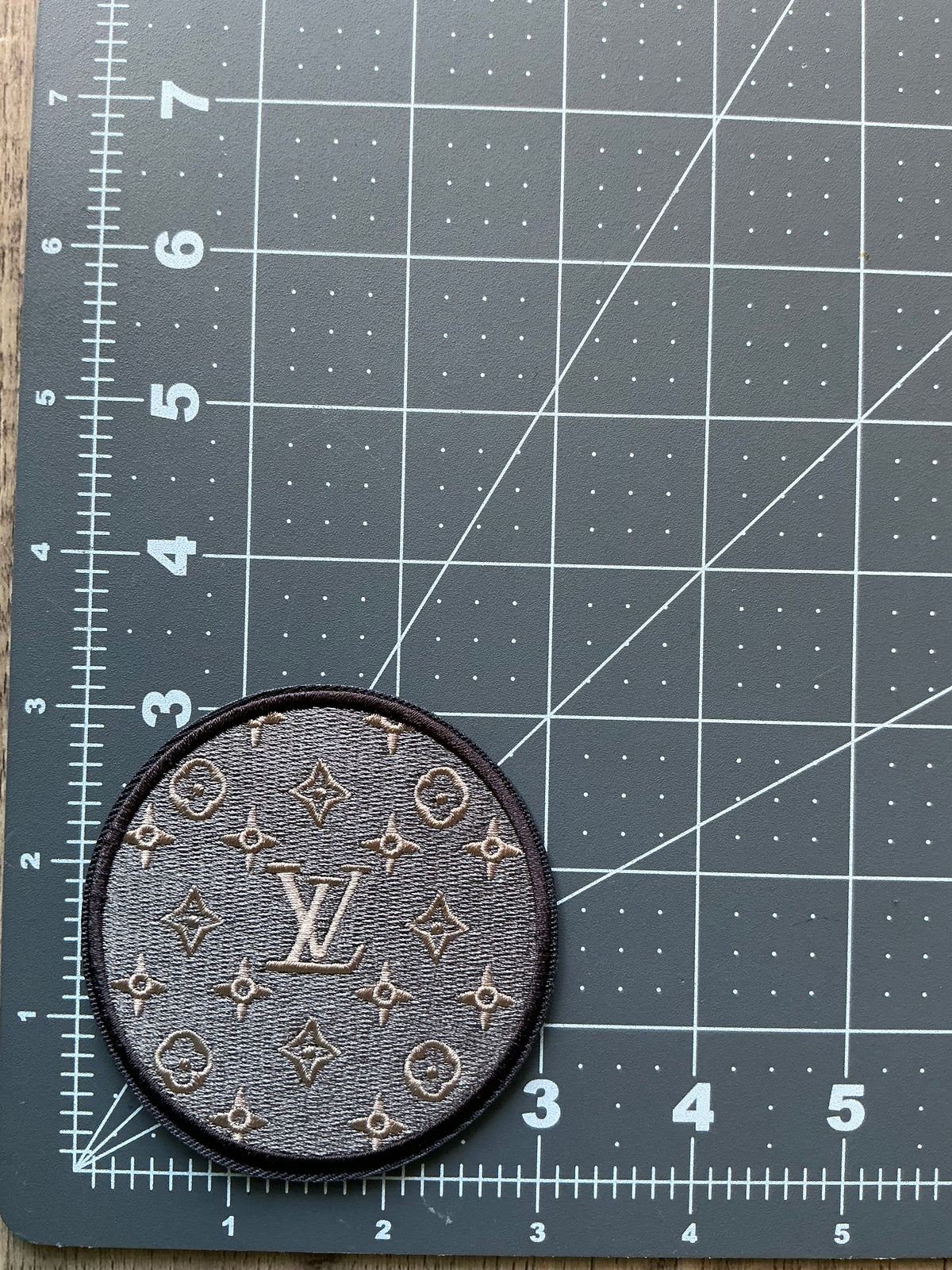 LV iron on patch