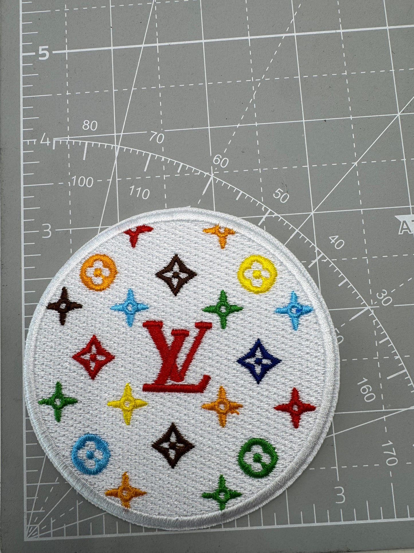 LV iron on patch