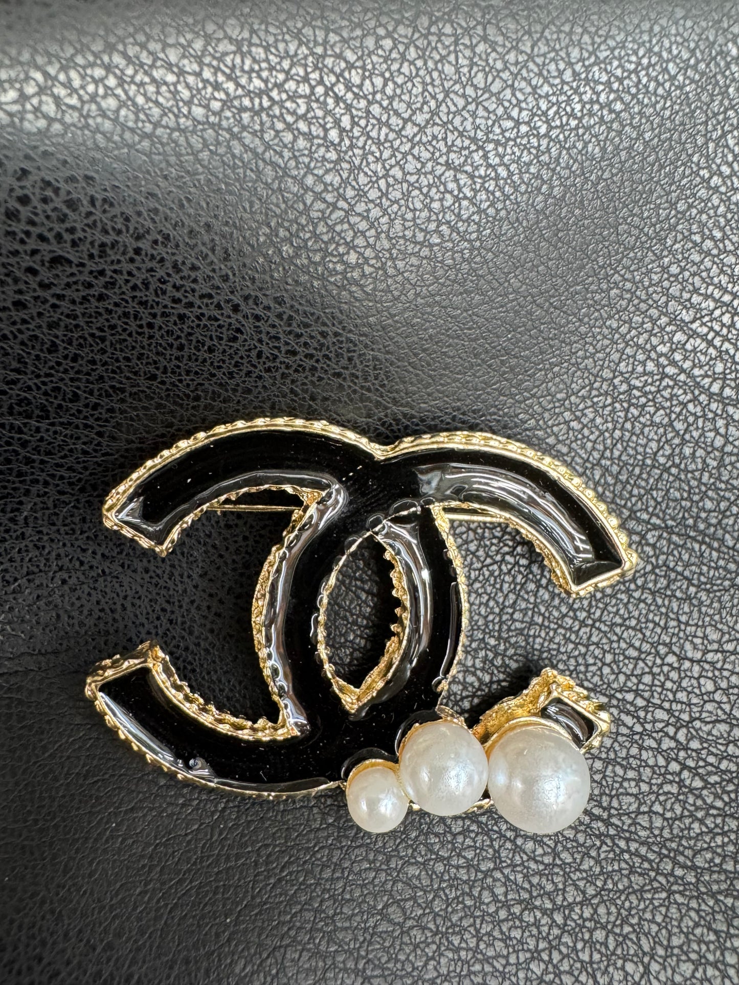CC brooch