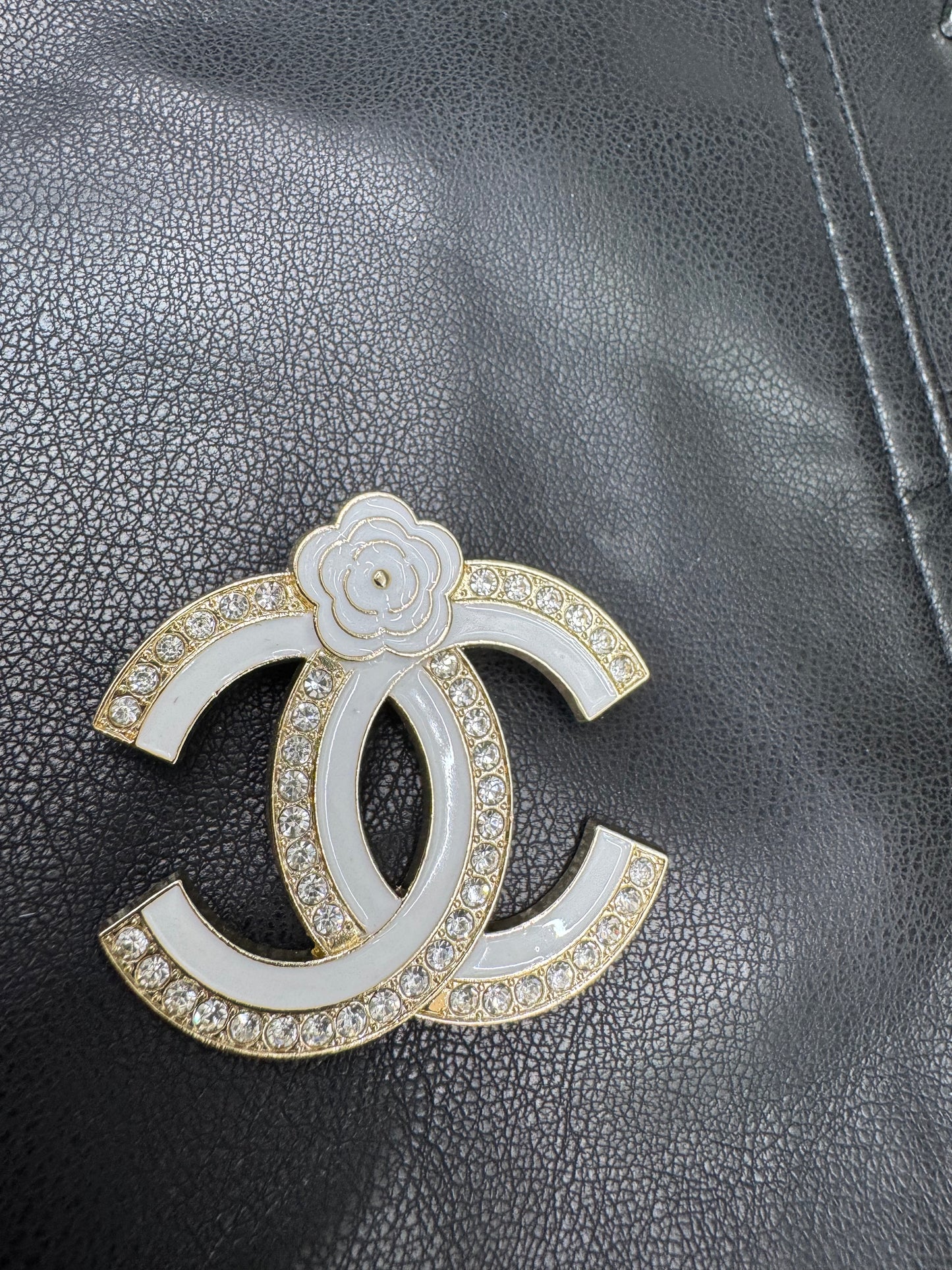 CC brooch
