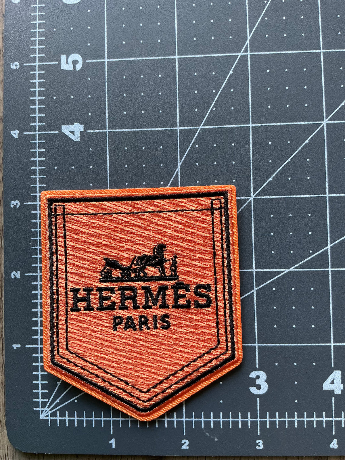 HER-MES pocket iron on Patch