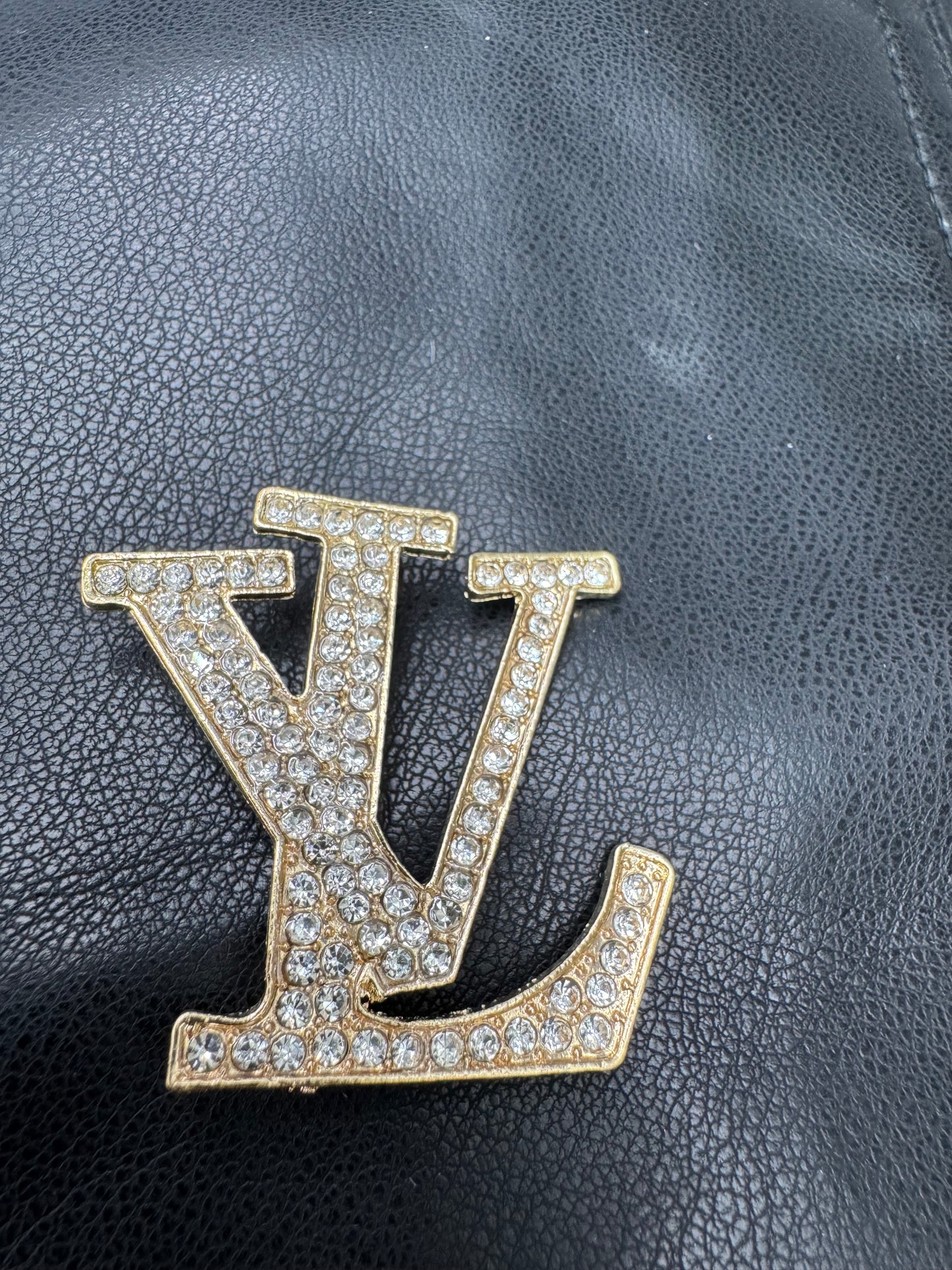 LV brooch