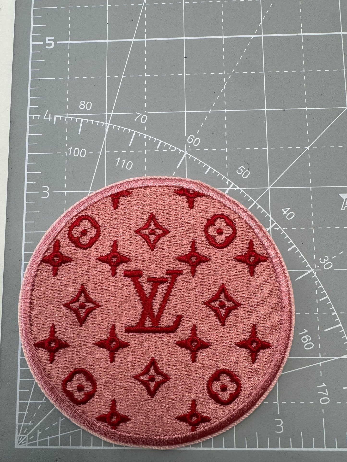 LV iron on patch
