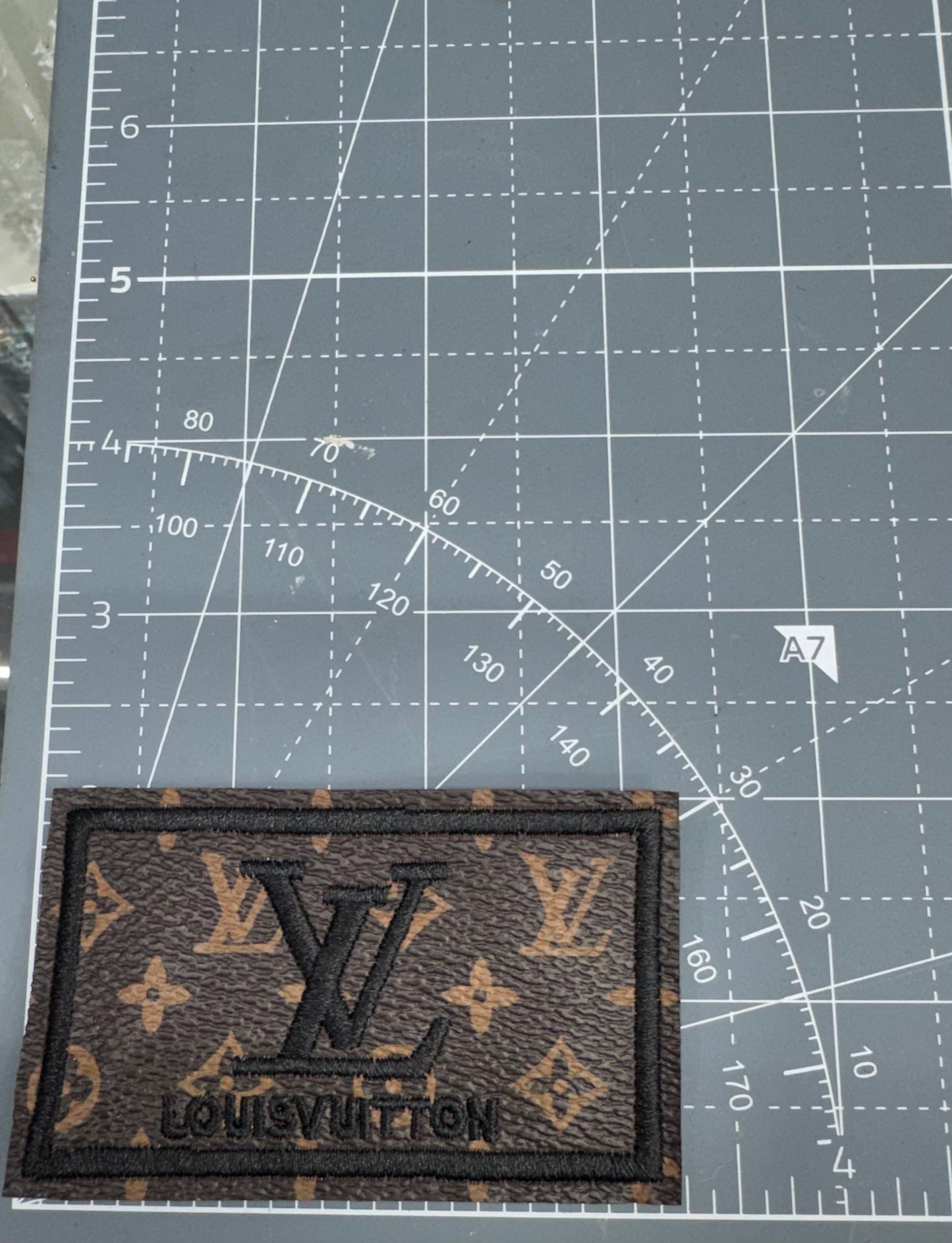 LV leather brown patch