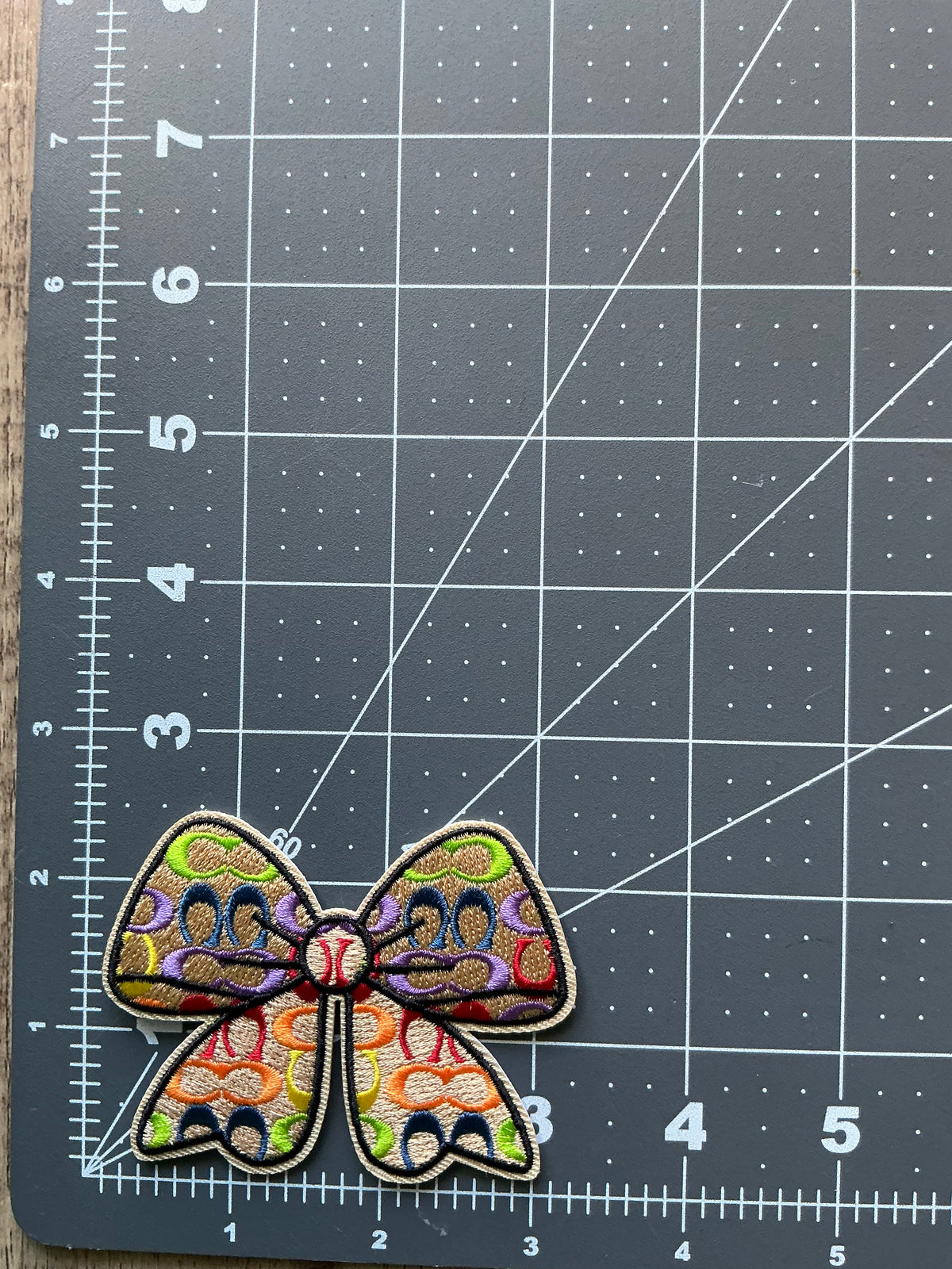 Multicolor coach bow iron on patch 