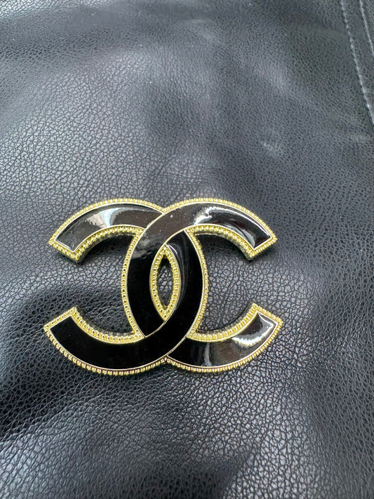 CC brooch