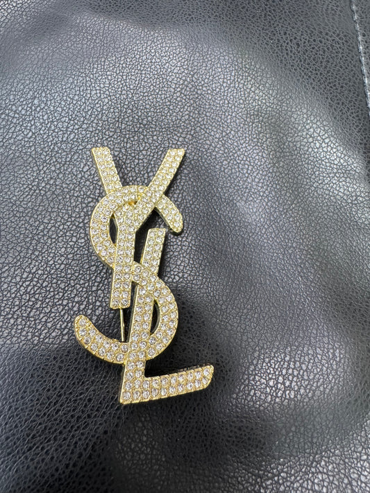 YSL brooch