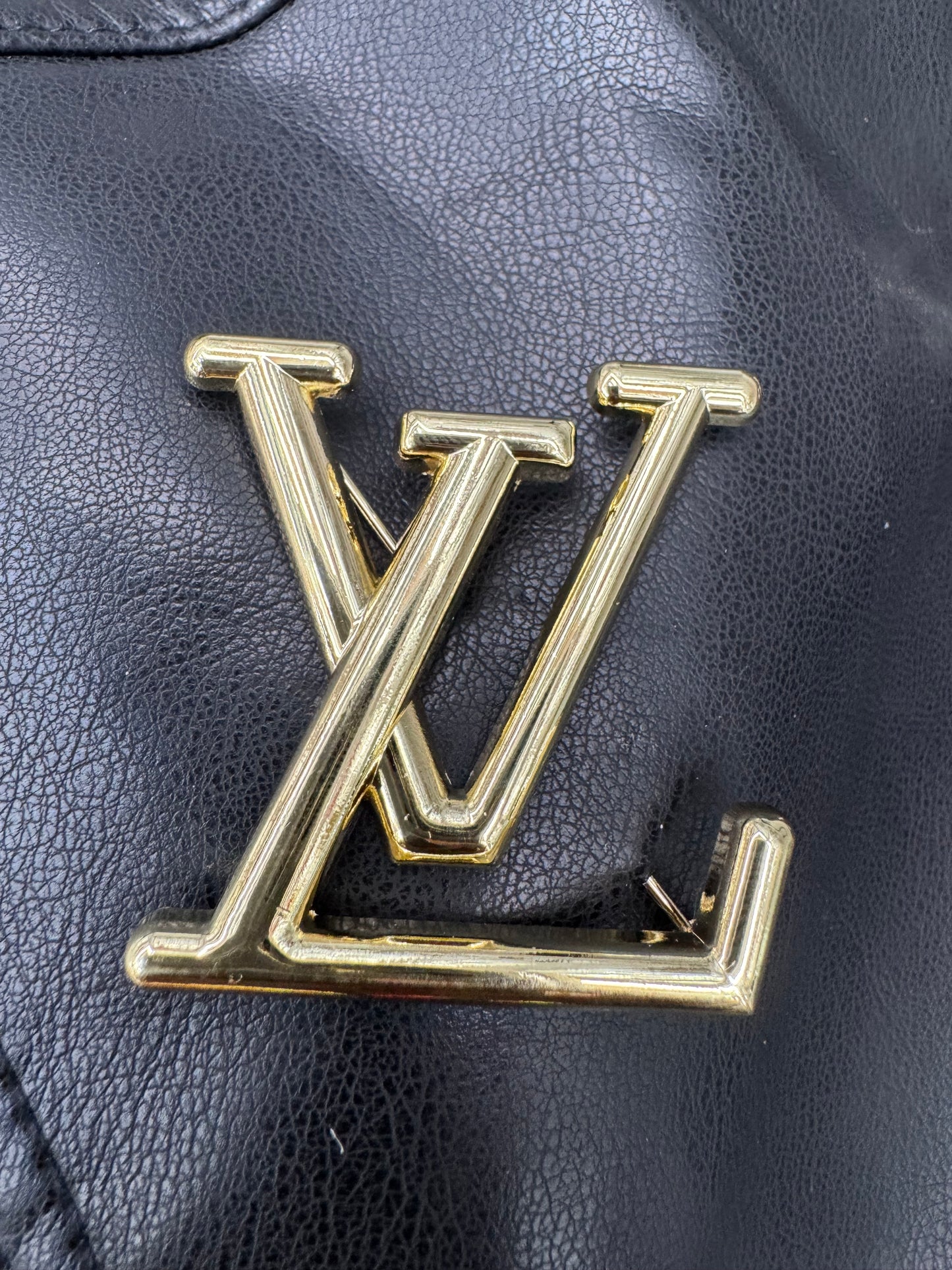Gold LV brooch