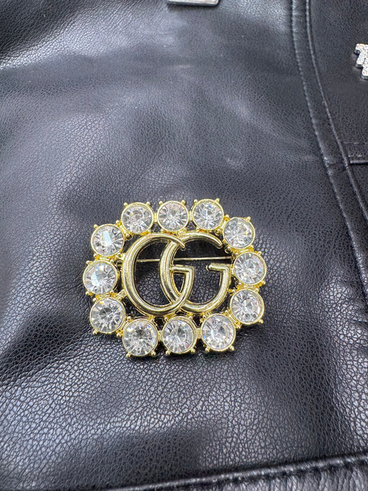 GG brooch