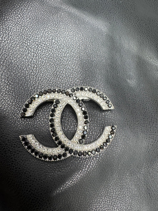 CC brooch