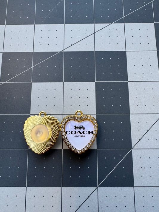 Coach charms