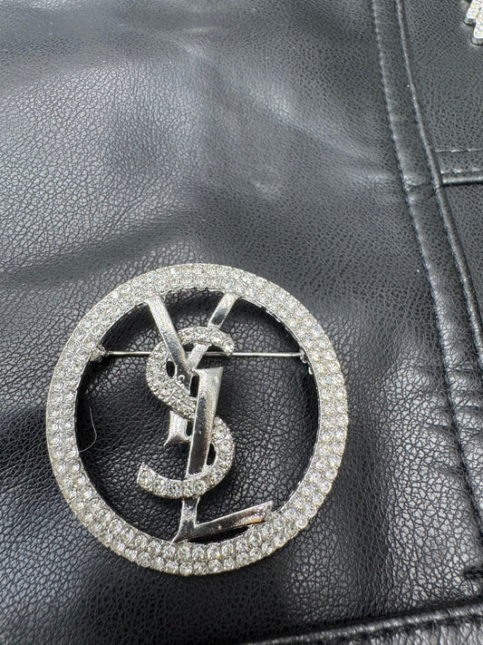 YSL brooch
