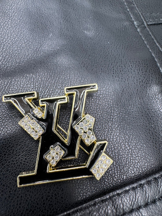 LV brooch