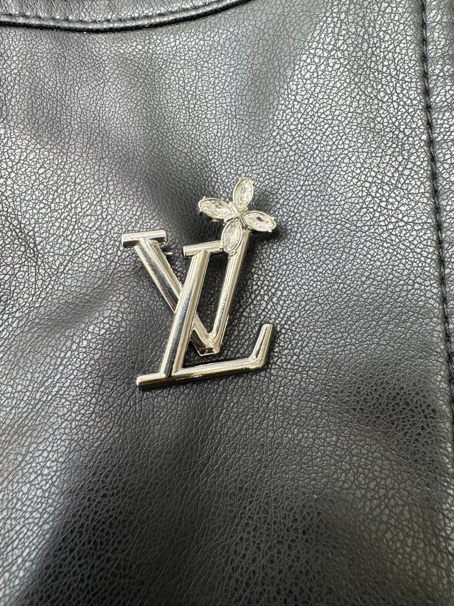 LV silver brooch