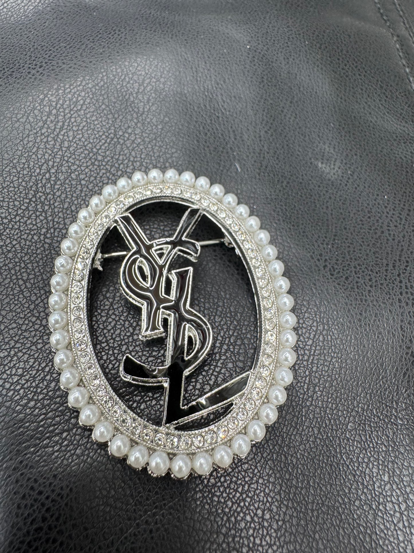 YSL brooch