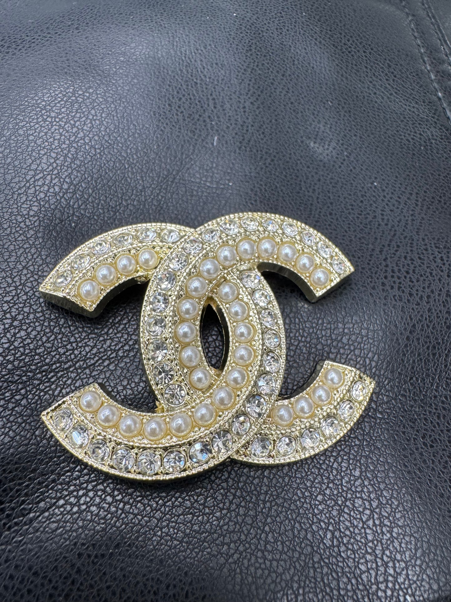 CC brooch