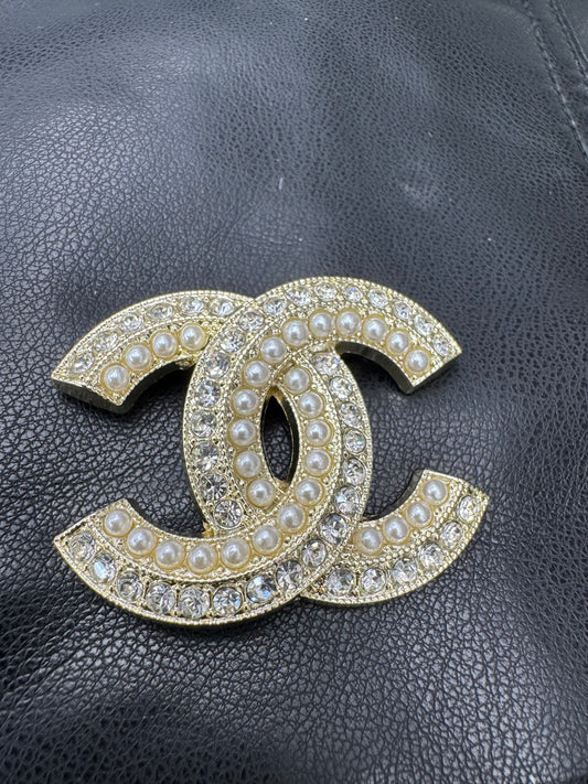 CC brooch