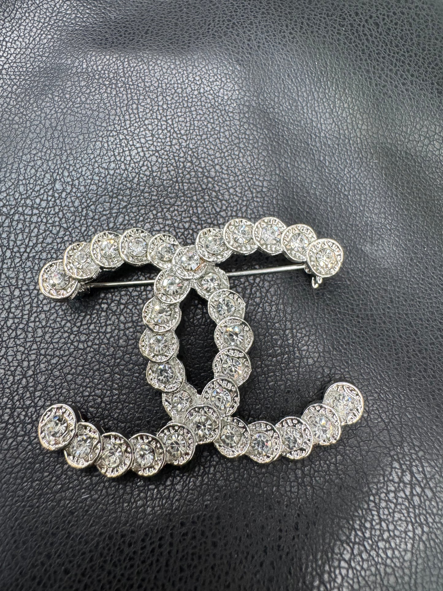 CC brooch
