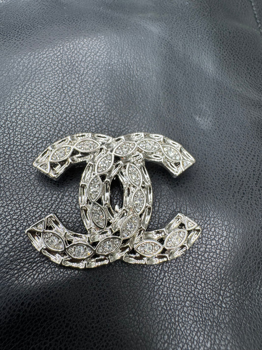 CC brooch