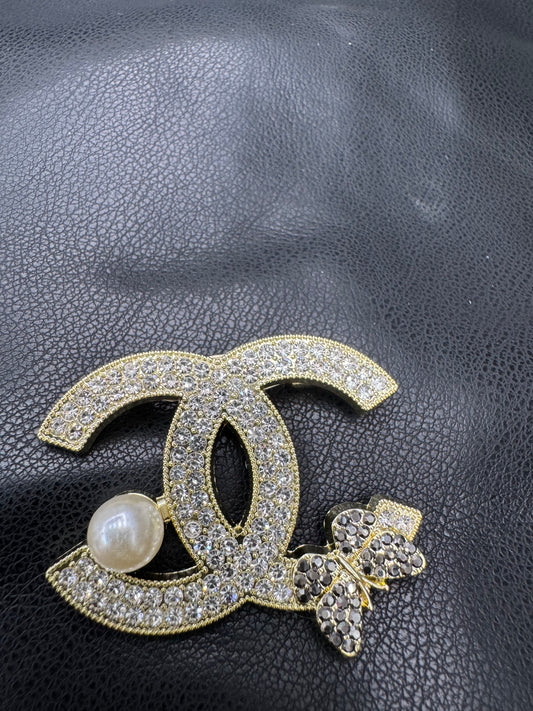 CC brooch