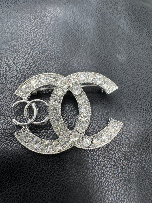 CC brooch