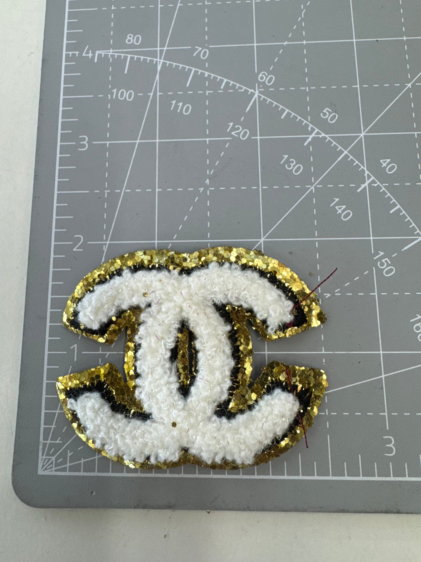 White & gold CC patch