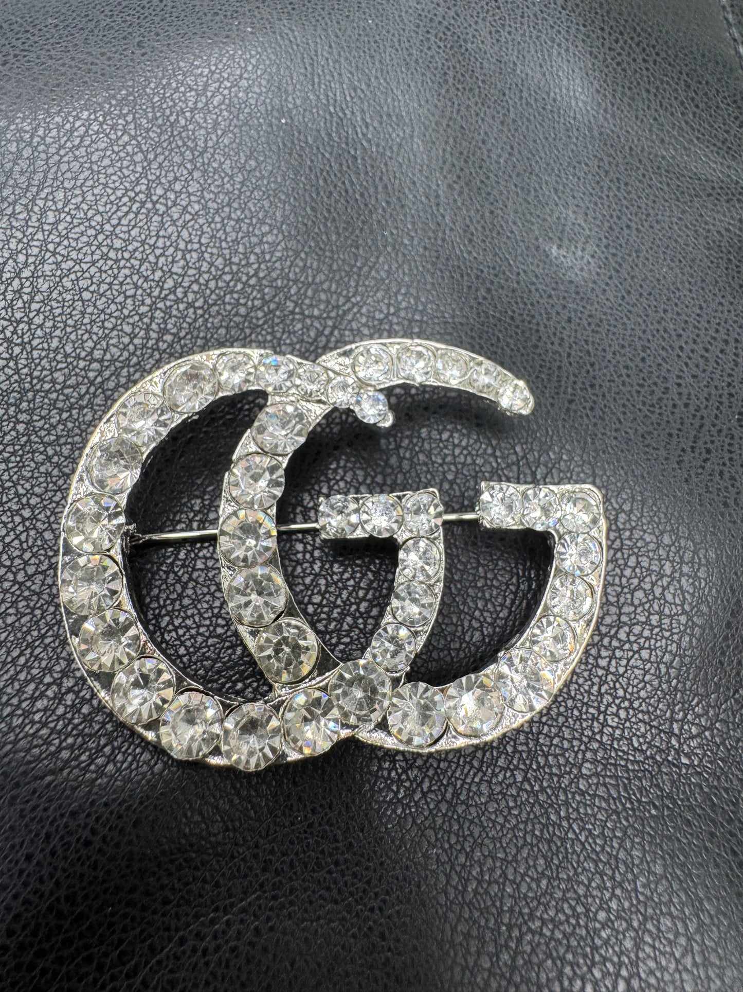 GG brooch