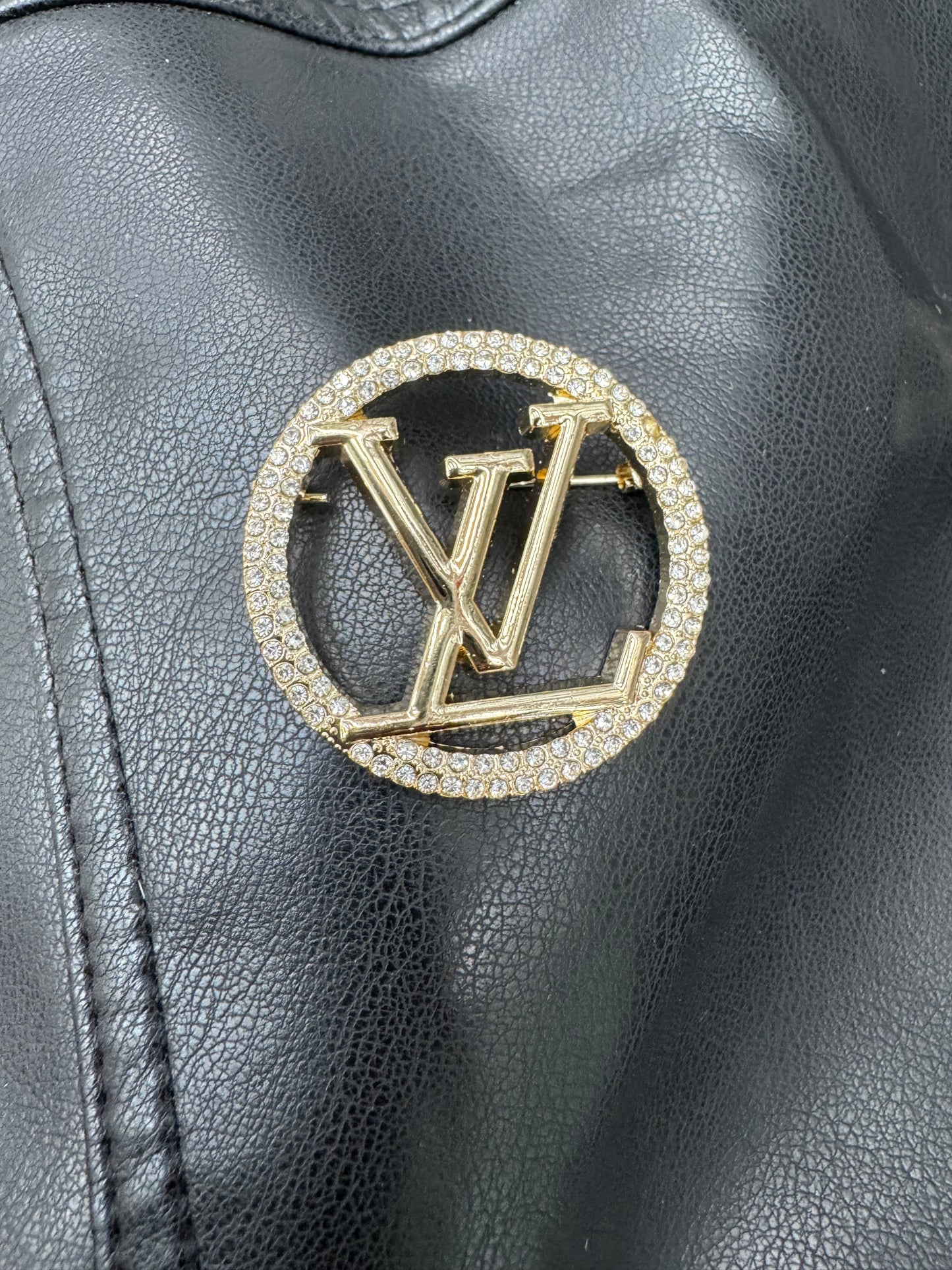 Gold LV brooch