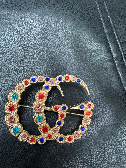 GG brooch