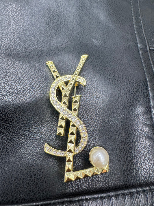 YSL brooch