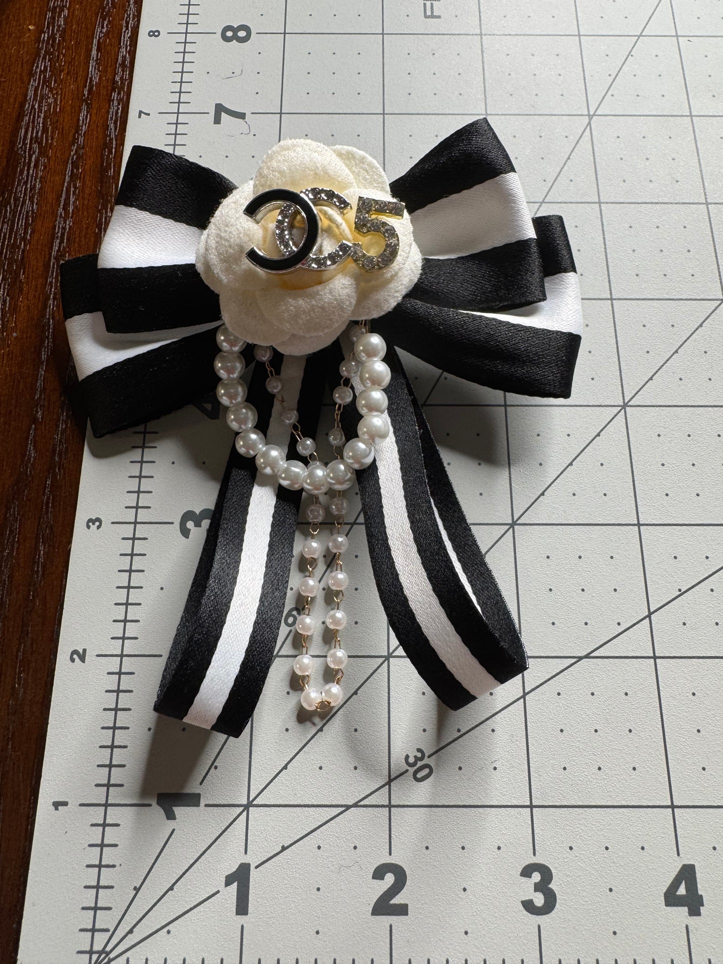 CC bows Brooches