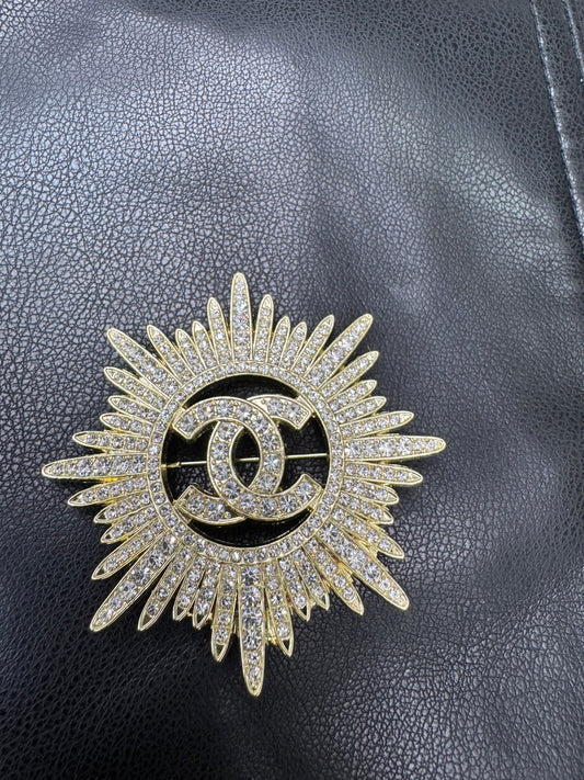 CC brooch