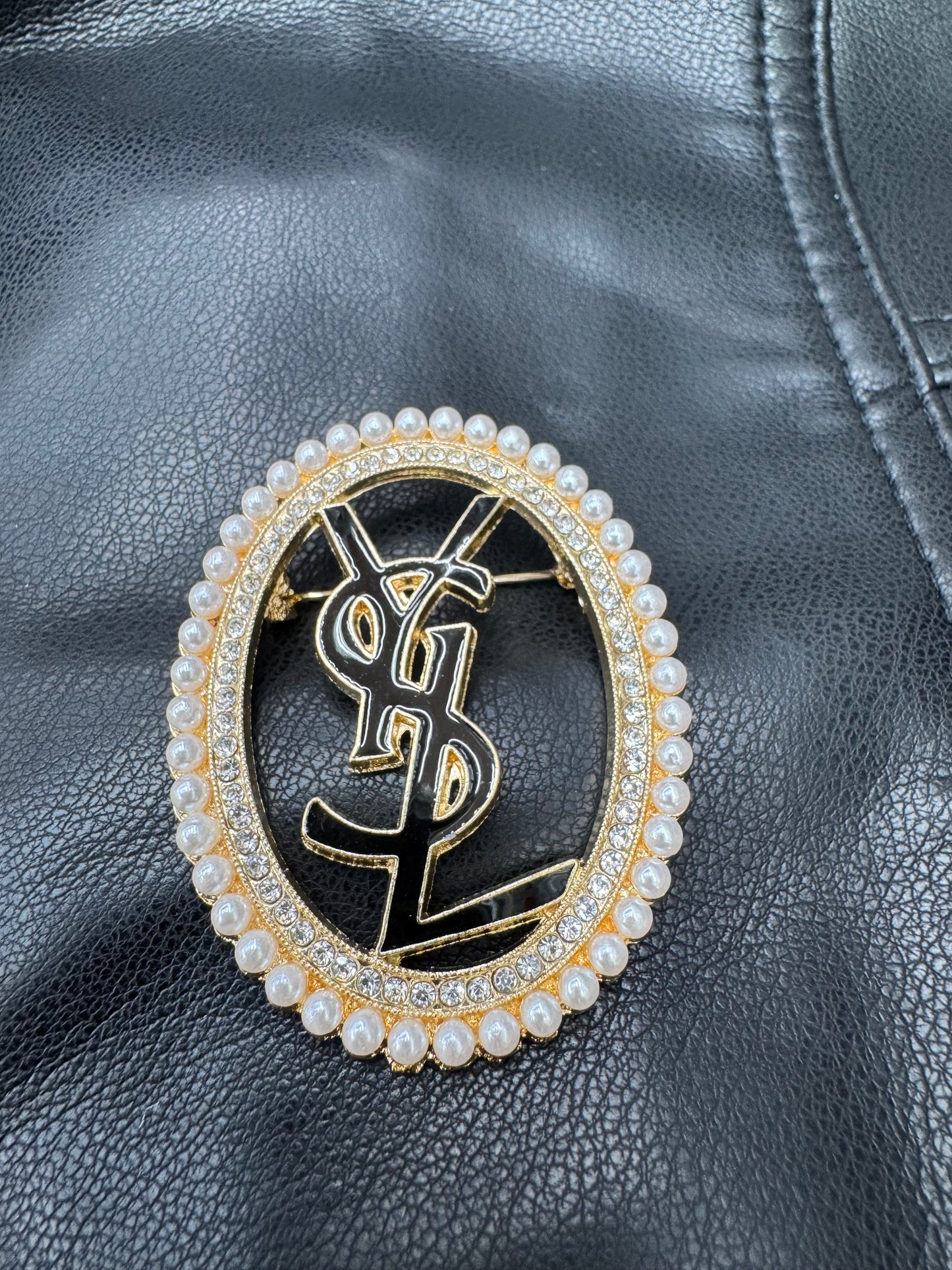 YSL brooch