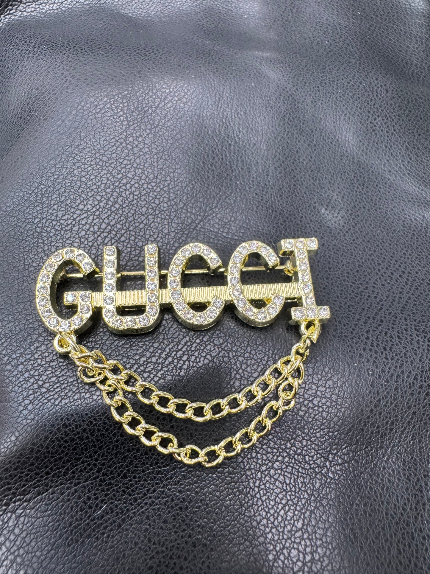 GG brooch