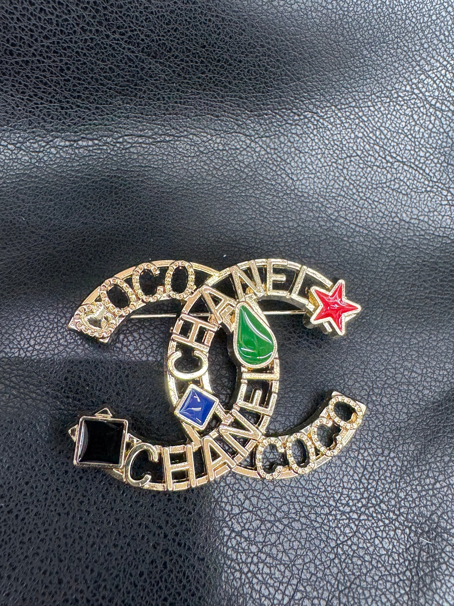 CC brooch