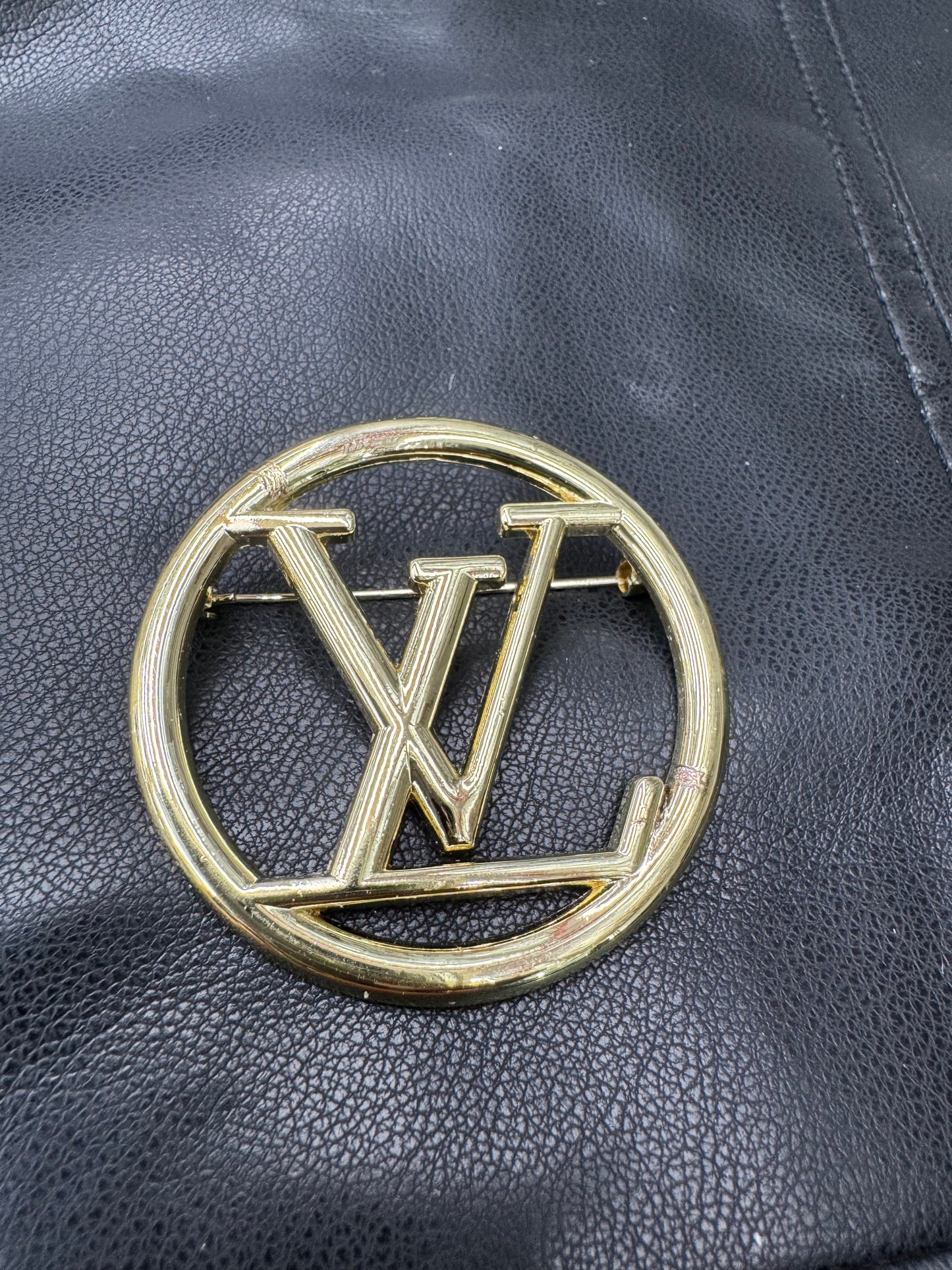 LV brooch
