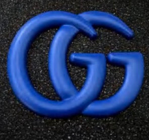 GG emblem catalog in gold and black